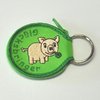 Schlüsselanhänger als Tasche mit Zipper, Motiv "Glücksschwein", Größe 5 x 6 cm